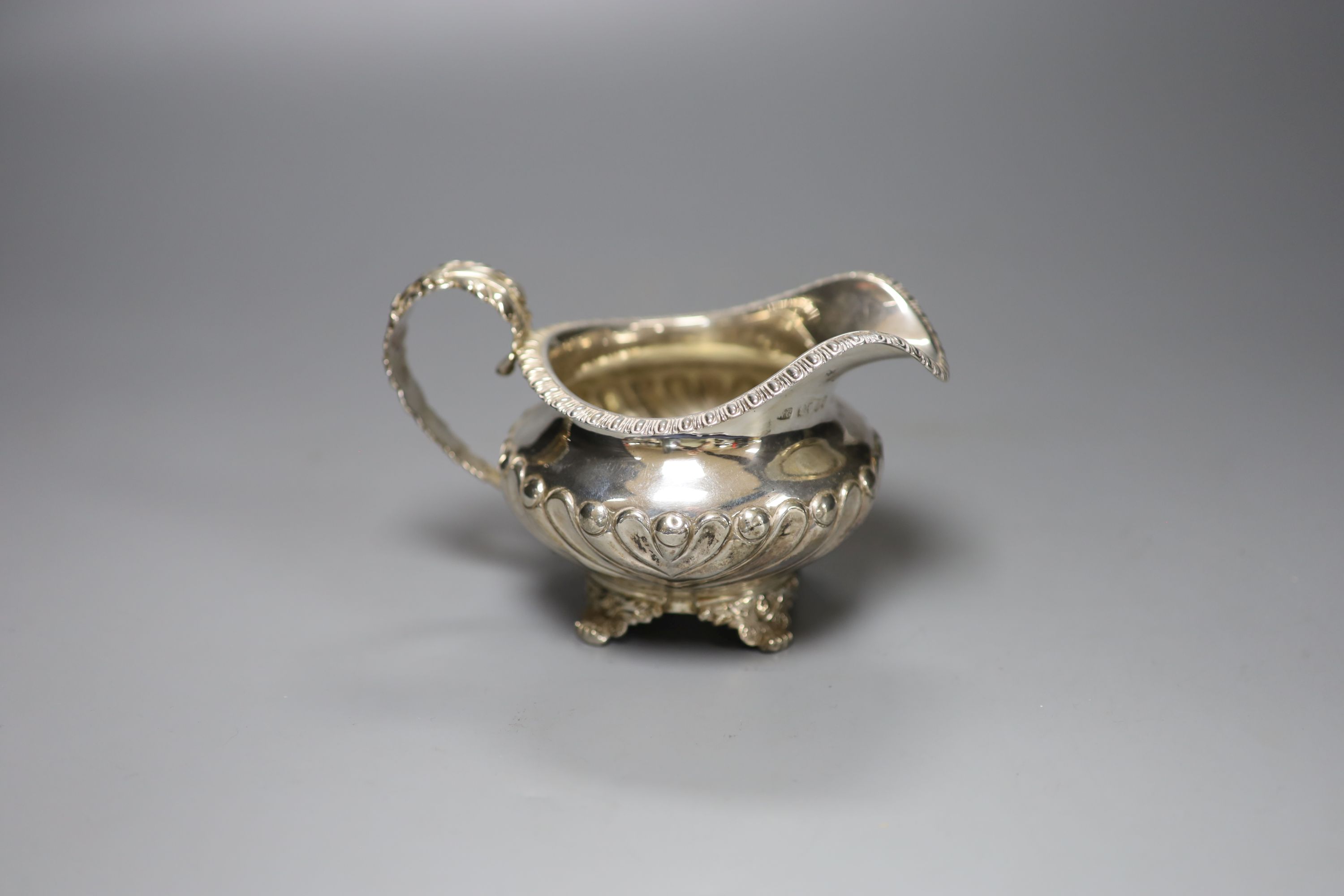 A George IV silver cream jug, William Chawner II, London, 1825, 7oz.